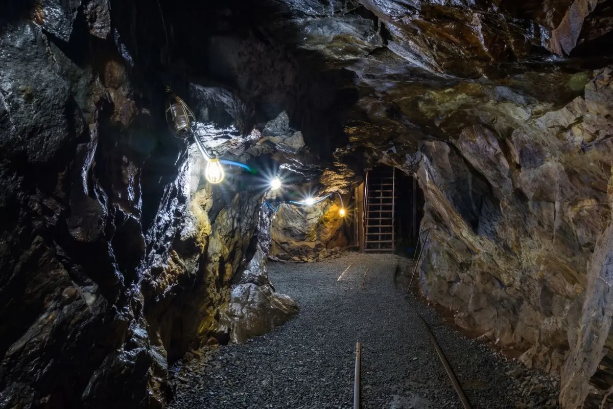 Visitors exploring an underground gold mine in Dahlonega, Georgia
